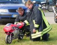 Mini MV Agusta and fireman